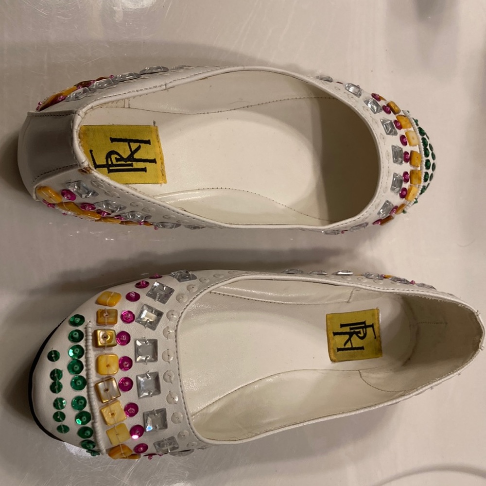 Bejeweled slip ons. Size 8 1/2. White base with multi colores sequins